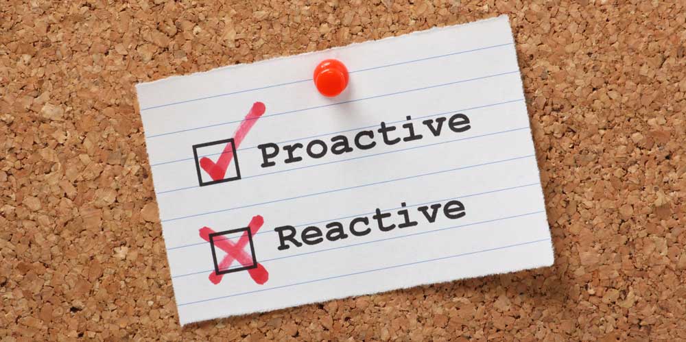 proactive and reactive written on piece of paper